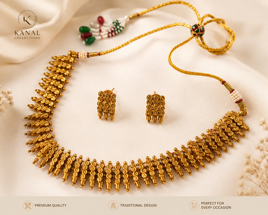Flat lay view of a premium quality traditional antique gold jewelry set with adjustable drawstring cord by Kanal Collections